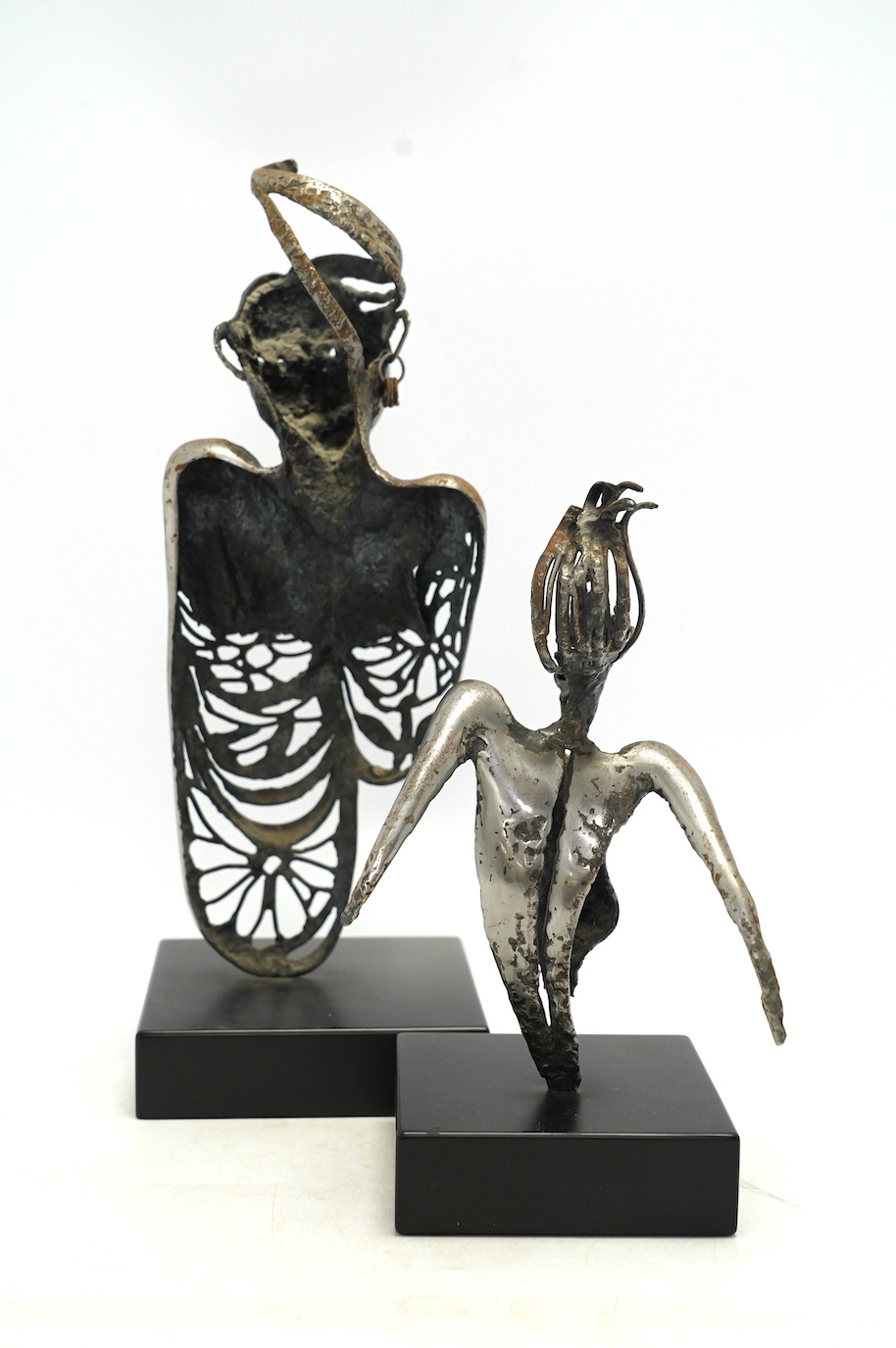 Two contemporary 'Brutalist' cast iron sculptures, initialled RI, tallest 39cm. Condition - fair to good